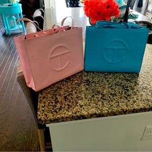 Baby pink and blue telfar hand bags